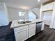Kitchen island with granite countertops, stainless steel appliances, and white cabinetry at 846 Star Estates Ave, North Las Vegas, NV 89086