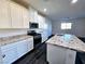 Modern kitchen features granite countertops, stainless steel appliances, and white cabinetry at 846 Star Estates Ave, North Las Vegas, NV 89086