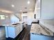 Spacious kitchen with granite countertops, stainless steel appliances, white cabinets, and wood flooring at 846 Star Estates Ave, North Las Vegas, NV 89086
