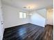 Inviting living room showcasing wood-look floors and a stylish chandelier at 846 Star Estates Ave, North Las Vegas, NV 89086