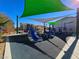 Colorful community playground with a slide, climbing structures, and shade canopies for Gathering fun at 846 Star Estates Ave, North Las Vegas, NV 89086