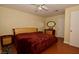 Primary bedroom with king-size bed and ensuite bathroom at 8600 W Charleston Blvd # 2101, Las Vegas, NV 89117