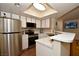 Modern kitchen with stainless steel appliances and white cabinets at 8600 W Charleston Blvd # 2101, Las Vegas, NV 89117