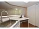 Modern kitchen with stainless steel sink and dishwasher at 8600 W Charleston Blvd # 2101, Las Vegas, NV 89117