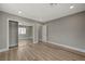 Bedroom with mirrored closet doors and hardwood floors at 909 Rhyolite Ter, Henderson, NV 89011