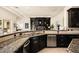 Modern kitchen with a large island and ample counter space at 9513 Verlaine Ct, Las Vegas, NV 89145