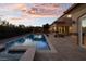 Stunning pool and spa with extensive patio space at 9513 Verlaine Ct, Las Vegas, NV 89145