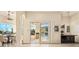 Indoor wet bar with access to the outdoor patio and pool area at 9513 Verlaine Ct, Las Vegas, NV 89145
