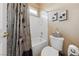 Bathroom with shower and patterned curtain at 10372 Hawks Wing St, Las Vegas, NV 89178
