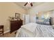 Bedroom with a full bed and mirrored closet at 10372 Hawks Wing St, Las Vegas, NV 89178
