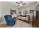Bedroom with daybed and ceiling fan at 10372 Hawks Wing St, Las Vegas, NV 89178