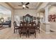 Formal dining room showcasing a beautiful china cabinet and hardwood floors at 10372 Hawks Wing St, Las Vegas, NV 89178