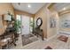 Elegant entryway with tile floors and decorative accents at 10372 Hawks Wing St, Las Vegas, NV 89178