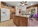 Spacious kitchen with island and stainless steel appliances at 10372 Hawks Wing St, Las Vegas, NV 89178