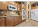 Kitchen with double oven and granite countertops at 10372 Hawks Wing St, Las Vegas, NV 89178