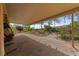 Covered patio with flagstone flooring and a view of the backyard at 10372 Hawks Wing St, Las Vegas, NV 89178