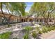 Community patio area with seating and landscaping at 10372 Hawks Wing St, Las Vegas, NV 89178