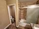 Bathroom with granite vanity, tiled shower and tub at 121 E Cypress Dr, Henderson, NV 89015