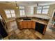 Large kitchen island with granite countertop and sink at 121 E Cypress Dr, Henderson, NV 89015