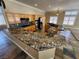Large kitchen with granite countertops and wood cabinets at 121 E Cypress Dr, Henderson, NV 89015