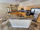 Granite countertop kitchen island, stainless steel appliances at 121 E Cypress Dr, Henderson, NV 89015