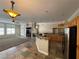 Open floor plan with kitchen, living room, and fireplace visible at 121 E Cypress Dr, Henderson, NV 89015