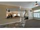 Open concept kitchen and living area with fireplace at 121 E Cypress Dr, Henderson, NV 89015