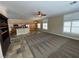 Spacious living room with high ceilings and a ceiling fan at 121 E Cypress Dr, Henderson, NV 89015