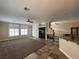 Bright living room with tile floors, fireplace, and large windows at 121 E Cypress Dr, Henderson, NV 89015