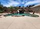 Stunning pool and spa with rock waterfall and spacious patio area at 121 E Cypress Dr, Henderson, NV 89015