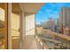 Enjoy city views from this condo balcony with glass railings and sliding glass doors at 135 E Harmon Ave # 1007, Las Vegas, NV 89109