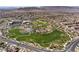 Aerial view of community park and surrounding homes at 161 Petaluma Valley Dr, Las Vegas, NV 89138