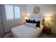 Cozy bedroom with a queen-size bed and calming decor at 161 Petaluma Valley Dr, Las Vegas, NV 89138