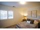 Comfortable bedroom with plush bedding and window shutters at 161 Petaluma Valley Dr, Las Vegas, NV 89138
