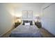 Spacious bedroom with a king-size bed and two nightstands at 161 Petaluma Valley Dr, Las Vegas, NV 89138