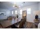 Bright dining area with wood table and modern lighting at 161 Petaluma Valley Dr, Las Vegas, NV 89138