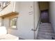 Townhome entry with tiled steps and dark brown door at 161 Petaluma Valley Dr, Las Vegas, NV 89138
