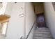 Townhome entry with tiled steps and dark brown door at 161 Petaluma Valley Dr, Las Vegas, NV 89138