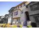 Beautiful three-story townhome with maroon accents at 161 Petaluma Valley Dr, Las Vegas, NV 89138