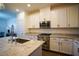 Bright kitchen featuring white cabinets and granite countertops at 161 Petaluma Valley Dr, Las Vegas, NV 89138