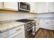 Stainless steel range and granite countertops in kitchen at 161 Petaluma Valley Dr, Las Vegas, NV 89138