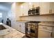 Modern kitchen with stainless steel appliances and granite countertops at 161 Petaluma Valley Dr, Las Vegas, NV 89138