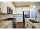 Spacious kitchen with stainless steel appliances and granite countertops at 161 Petaluma Valley Dr, Las Vegas, NV 89138
