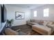 Spacious living area with large sectional sofa and wood floors at 161 Petaluma Valley Dr, Las Vegas, NV 89138