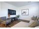 Relaxing living room, featuring a sectional sofa and large TV at 161 Petaluma Valley Dr, Las Vegas, NV 89138