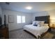 Large main bedroom with plush bed, ample space, and window seating at 161 Petaluma Valley Dr, Las Vegas, NV 89138