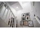 Elegant staircase with modern wall art at 161 Petaluma Valley Dr, Las Vegas, NV 89138