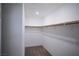 Spacious walk-in closet with ample shelving and hanging space at 161 Petaluma Valley Dr, Las Vegas, NV 89138