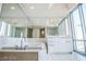 Bathroom with soaking tub and double vanity at 222 Karen Ave # 2601, Las Vegas, NV 89109