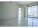 Bright bedroom with large windows and access to a balcony at 222 Karen Ave # 2601, Las Vegas, NV 89109